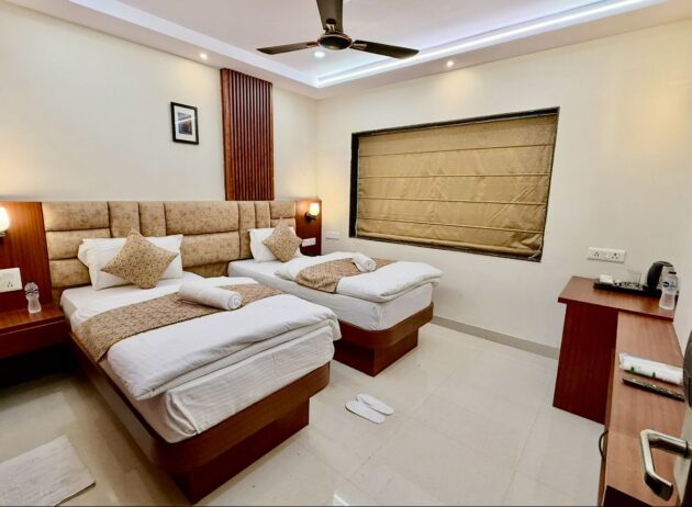 Twin Bed Room With City View - Image 7