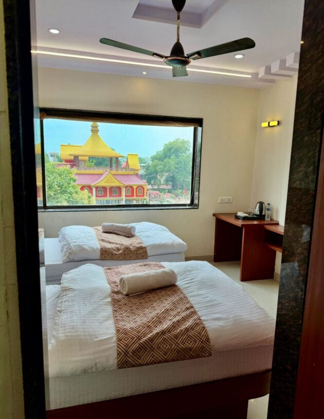 Twin Bed Room With City View - Image 3